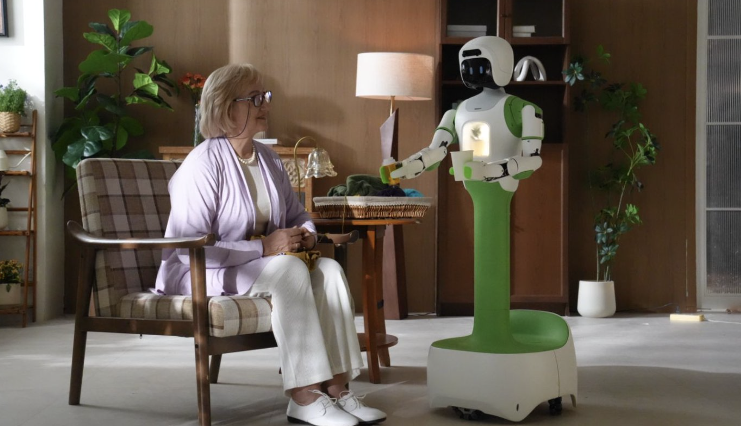 An older adult spending time at home with KOKO.